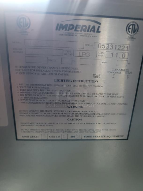 Imperial commercial cooking equipment label, model blank, serial 053331221, LPG gas type, 11.0 pressure, lighting instructions.