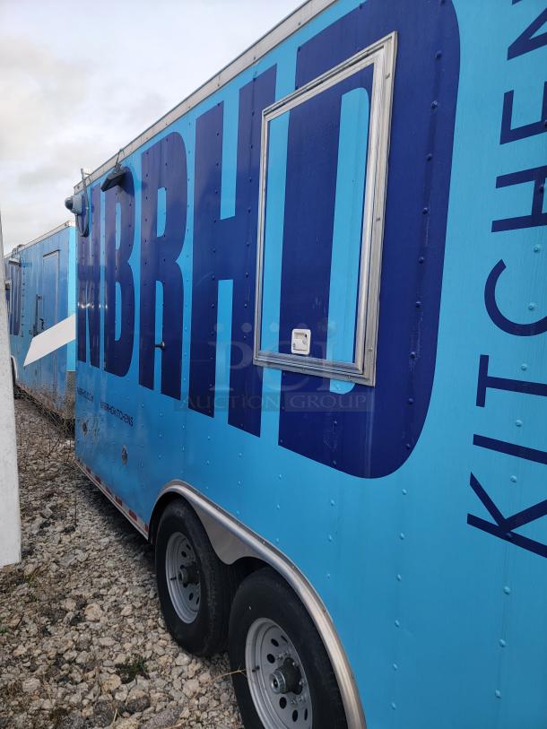 2020 24' Diamond Cargo mobile kitchen, dual-axle, blue graphics, needs cleaning, features premium commercial equipment.