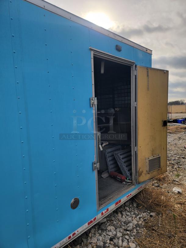 2020 24' Diamond Cargo mobile kitchen trailer with open yellow door, showing interior equipment. Needs cleaning.