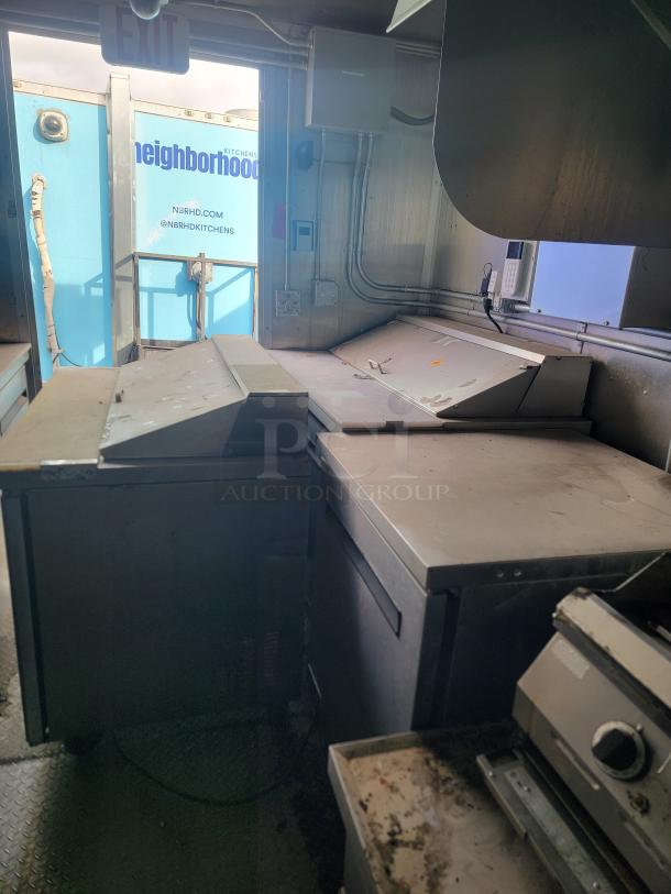Diamond Cargo mobile kitchen interior, custom-built 8.5 x 24 TA, featuring commercial equipment. Needs cleaning.