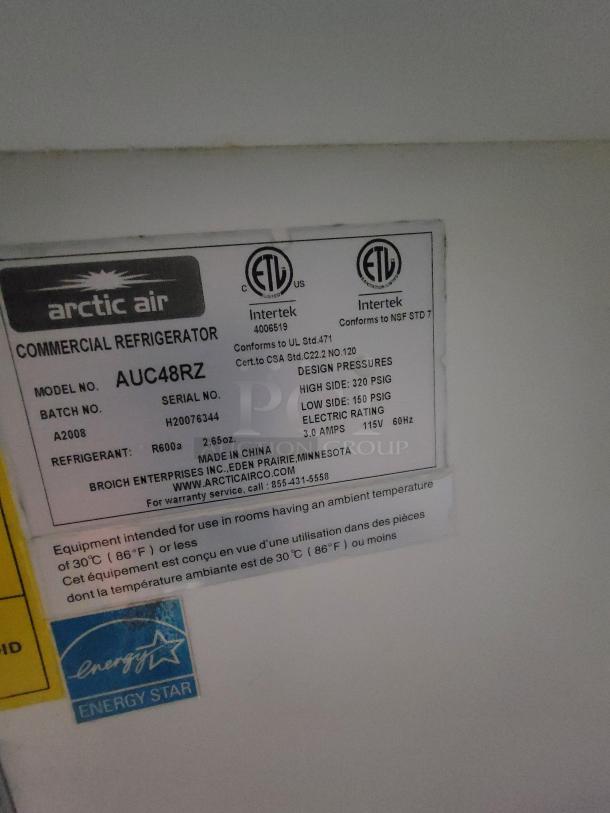 Arctic Air commercial refrigerator model AUC48RZ label, showing ETL certifications, batch number A2008, and Energy Star compliance.