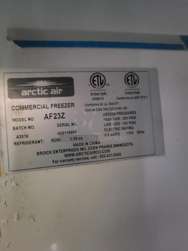 Arctic Air AF23Z commercial freezer label showing model, serial number, refrigerant type R290, and electric rating.