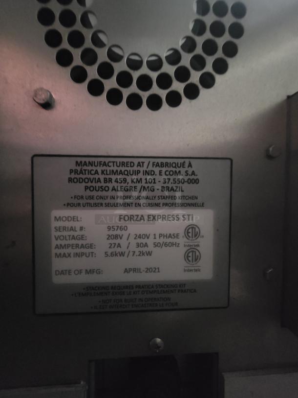 Label on Forza STi oven showing model 95760, voltage 208V/240V, manufactured April 2021 by Prática in Brazil.
