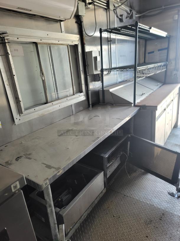 2019 Diamond Cargo 24' food trailer, stainless steel interior, ventilation hood, 3-compartment sink, needs cleaning.