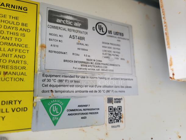 Arctic Air commercial refrigerator label, model AST48R, refrigerant R134a, UL listed, made in China.