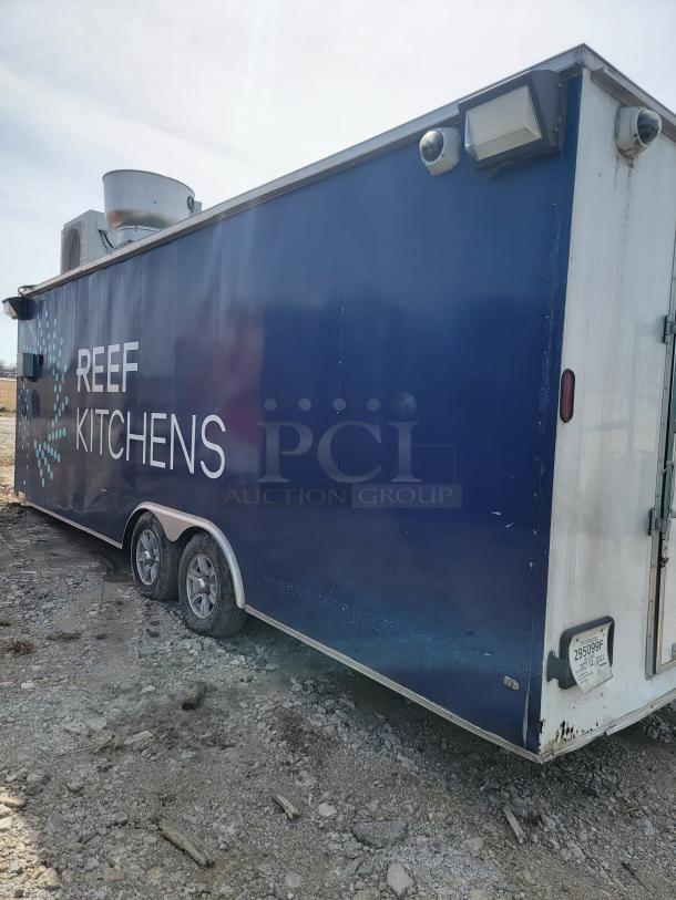 2019 Diamond Cargo 8.5x24 mobile kitchen trailer, blue exterior, visible wear, equipped for high-volume food service.