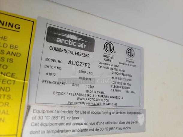 Label for Arctic Air commercial freezer model AUC27FZ. Includes UL and CSA certifications, refrigerant info, and contact details.