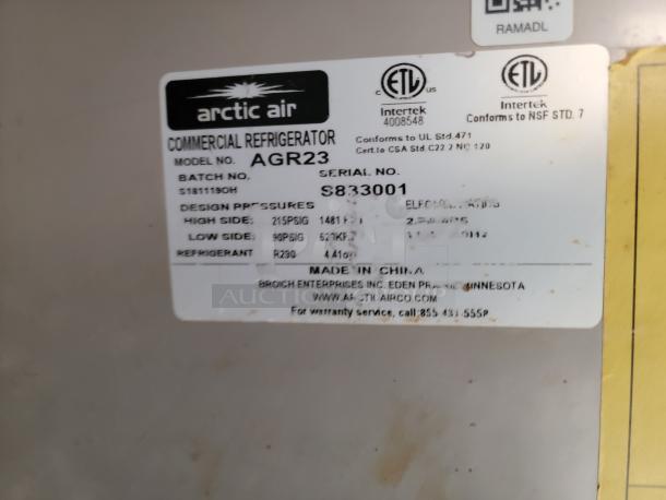 Label on Arctic Air commercial refrigerator, model AGR23, showing design pressures and refrigerant type R290.