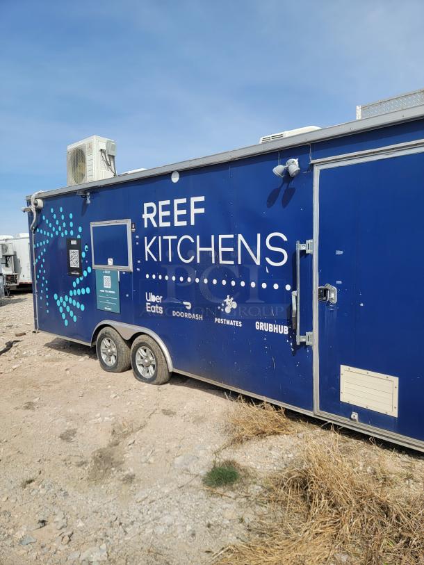 2019 Diamond Cargo 24' mobile kitchen trailer, blue exterior, branded with REEF Kitchens and food delivery logos.