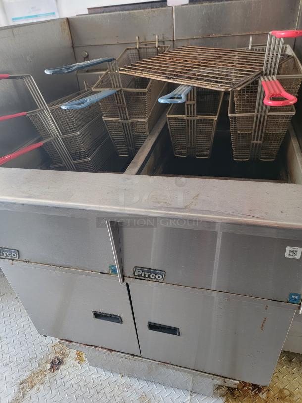 Pitco deep fryer with multiple baskets in a mobile kitchen, inside a 2019 Diamond Cargo trailer. Stainless steel finish.