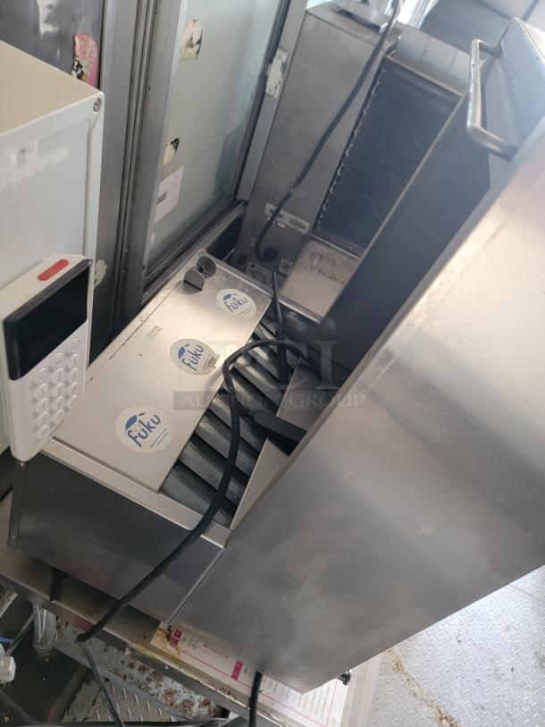 2019 Diamond Cargo 24' mobile kitchen interior, showing stainless steel appliances and equipment in used condition.