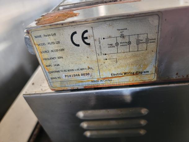 Label on a panini grill showing model PG2SS-120, AC110-120V source, 60Hz frequency, 14.6A, made in China, with wiring diagram.