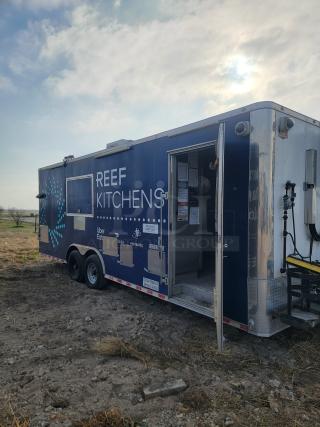 2019 Diamond Cargo 24' mobile kitchen trailer, dual-axle, branded "REEF KITCHENS," features professional Serv-Ware and Dukers equipment. Needs cleaning and minor exterior repair.