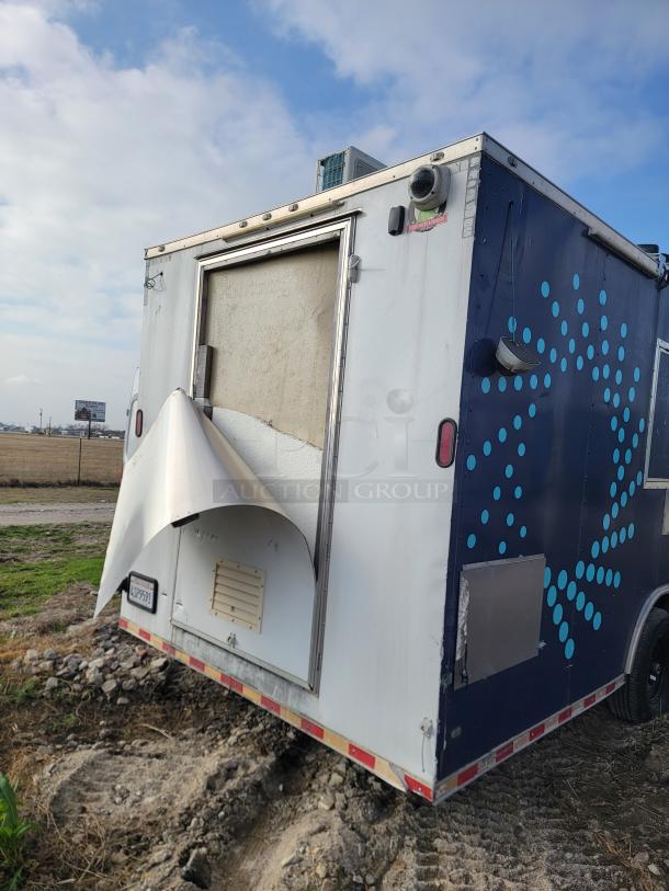 2019 Diamond Cargo 24' mobile kitchen trailer with exterior wear, heavy-duty 14,000 LB GVWR, requires minor repair.