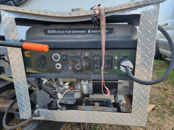 Cummins Onan P9500df dual fuel generator, remote start, mounted in diamond plate frame. Features multiple outlets and controls.
