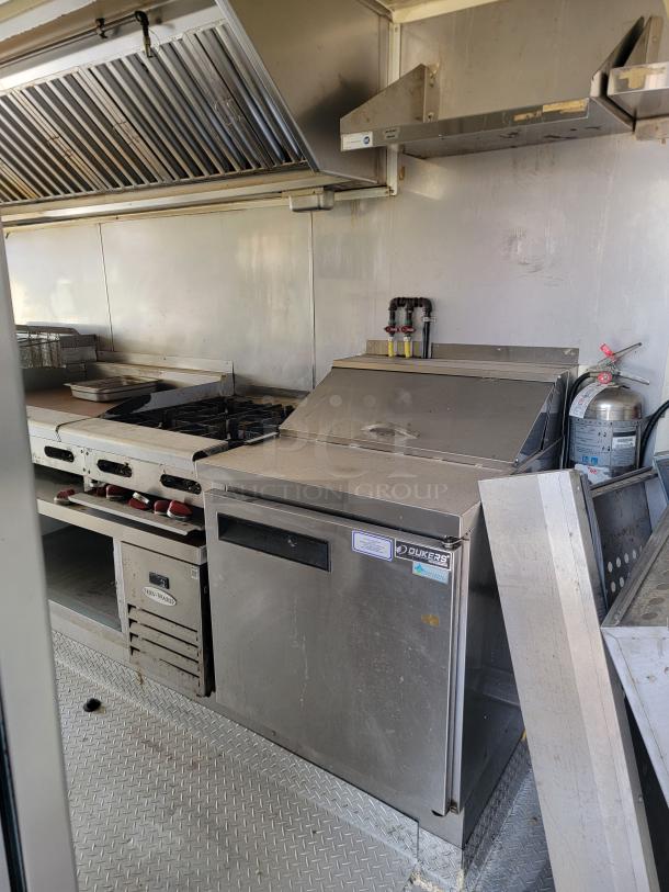 2019 Diamond Cargo 24' mobile kitchen, featuring Serv-Ware and Dukers equipment, needs cleaning and minor repairs.