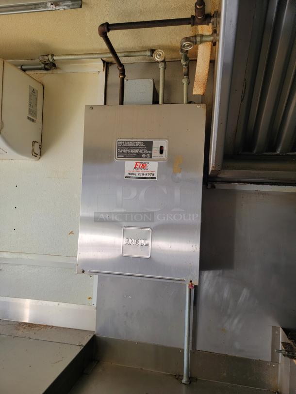 2019 Diamond Cargo 24' mobile kitchen featuring Ansul fire suppression system, interior view, requires cleaning and minor repairs.