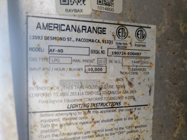 Tag on 2019 Diamond Cargo mobile kitchen indicating American Range Model AF-40, LPG gas type, 40,000 BTU/hr input.