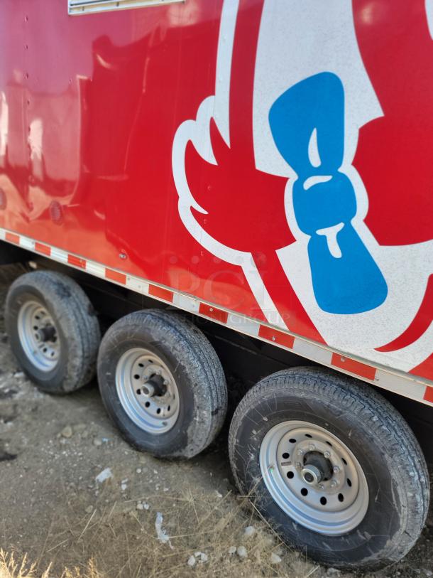 2022 Rock Solid Cargo 28' mobile kitchen trailer, triple-axle, Wendy's branding, high-volume culinary setup.