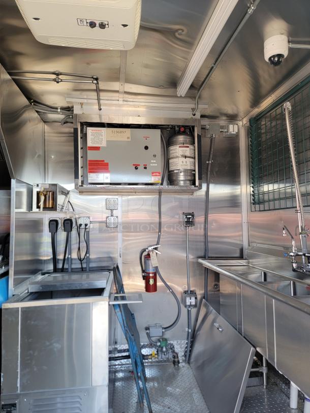 2022 Rock Solid Cargo 28' mobile kitchen interior, featuring commercial stainless steel equipment, electrical system, and safety features.