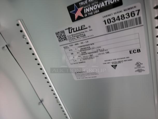 Label inside a 2022 Rock Solid Cargo mobile kitchen trailer, showing details like "True Manufacturing Co.," model HC-LD, serial number 10348367, and electrical specifications.