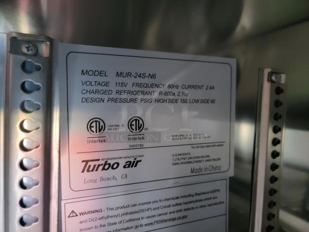 Turbo Air label on 2022 Rock Solid Cargo 28 mobile kitchen, model MUR-24S-N6, voltage 115V, R-600a refrigerant.