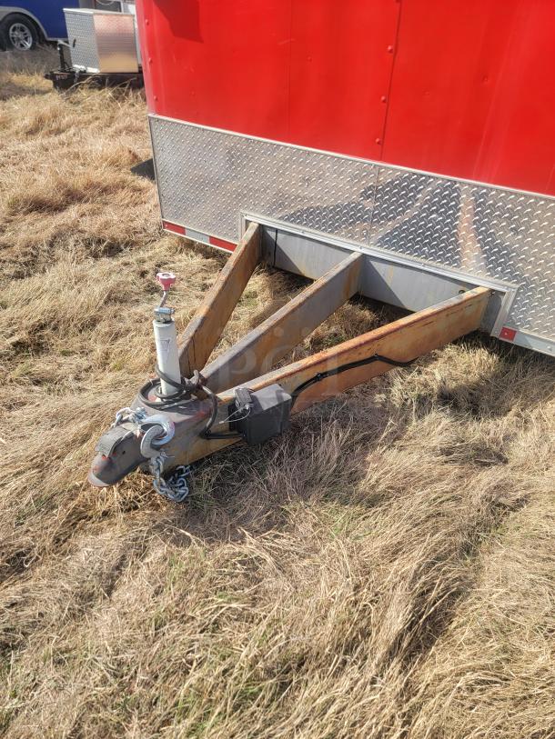 2021 Titanium Cargo 28' Triple Axle Mobile Kitchen hitch, red exterior, diamond plate siding, sturdy condition.