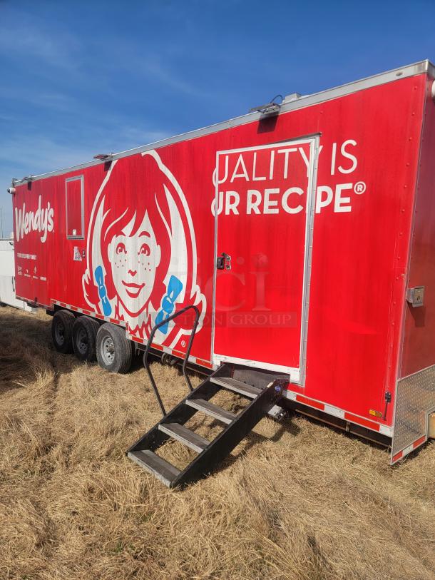 2021 Titanium Cargo 28' Triple Axle Mobile Kitchen with branded exterior, featuring premium equipment and triple axle design.