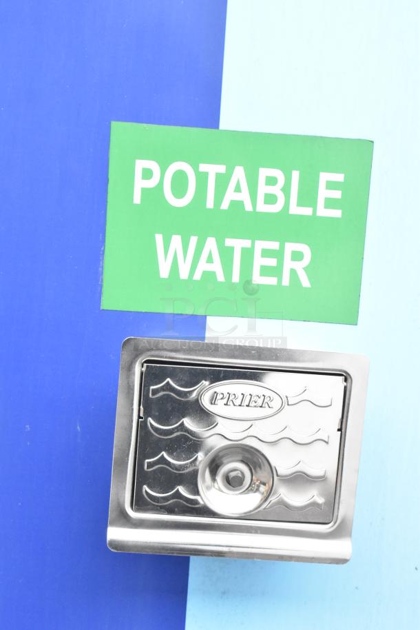 Potable water access with Prier marking on Rock Solid Cargo mobile kitchen trailer.