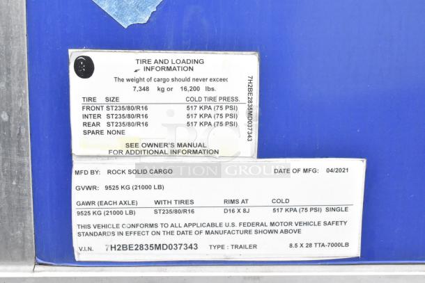 2021 Rock Solid Cargo 24' mobile kitchen trailer label with tire and loading information, manufacturer details, and VIN.