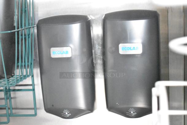 Ecolab automatic soap dispensers in a stainless steel trailer.