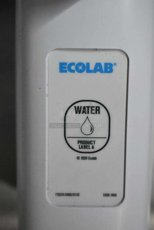 Close-up of a white Ecolab water label indicating "Product Label A" with the year 2020 noted.