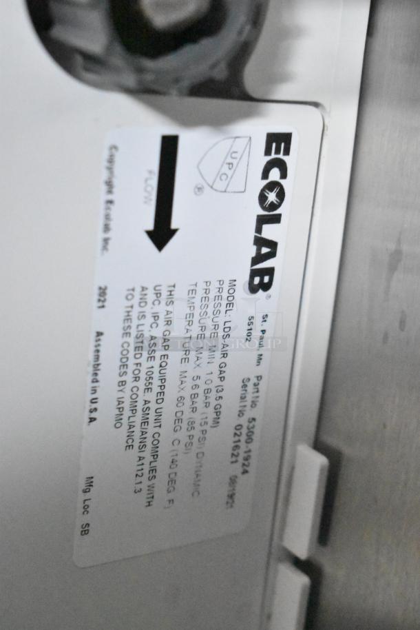 Ecolab air gap label with model details. 2021 Rock Solid Cargo 24' Burger King trailer appliance. Assembled in USA.