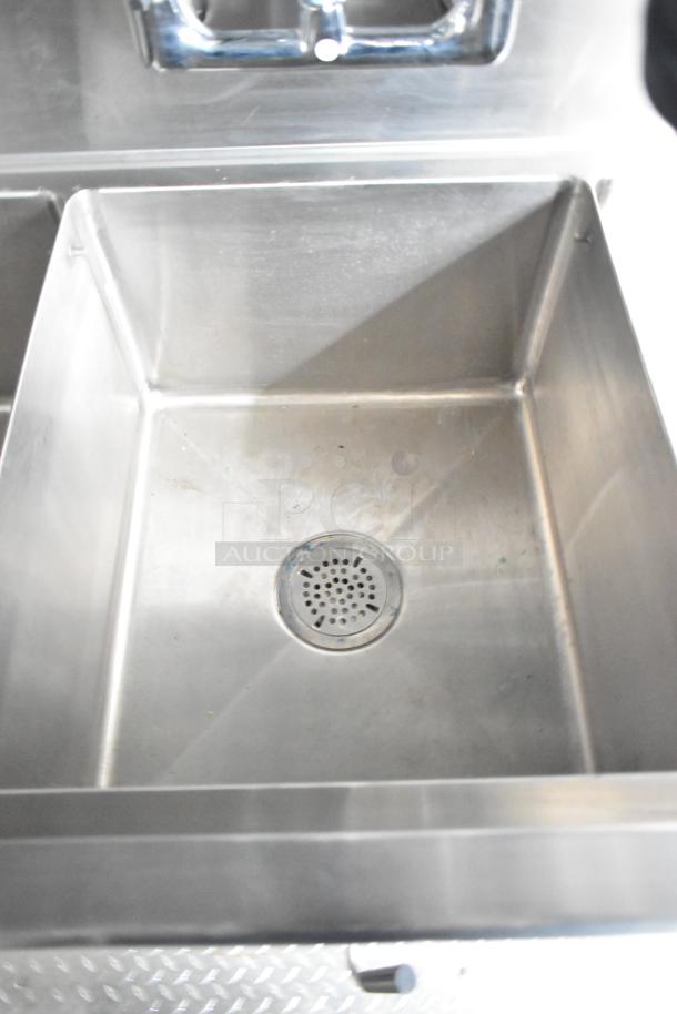 Stainless steel sink inside the 2021 Rock Solid Cargo 24' mobile kitchen trailer. Brand new, ready for fast food operations.