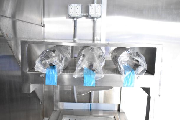 Stainless steel interior of a Brand New 2021 Rock Solid Cargo mobile kitchen with commercial-grade equipment.