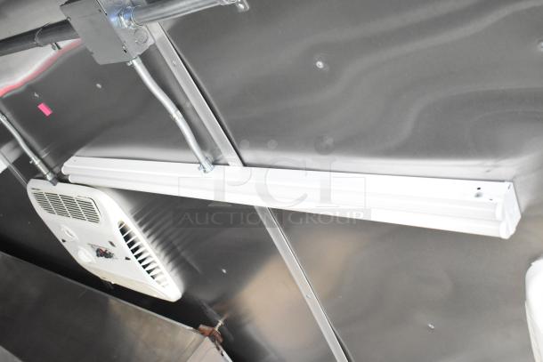 Interior view of Rock Solid Cargo 2021 trailer showing brand new fixtures and electrical installations, pristine condition.