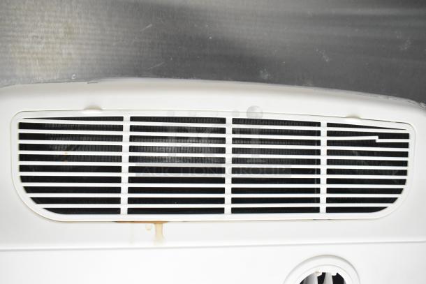 White CaptiveAire grease hood vent in pristine condition, part of a 2021 Rock Solid Cargo mobile kitchen trailer.