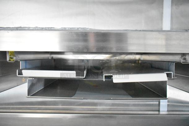 Commercial-grade equipment inside a brand new 2021 Rock Solid Cargo 24' Burger King mobile kitchen trailer.