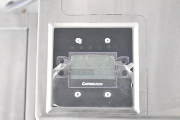 Control panel of CaptiveAire system inside 2021 Rock Solid Cargo mobile kitchen. Brand new condition, ready for use.