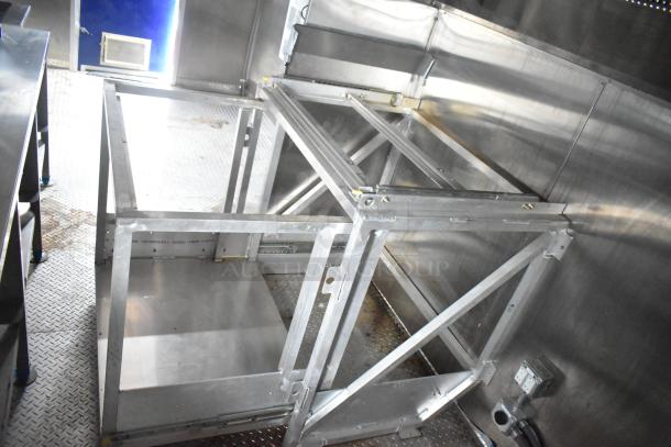 Brand new 2021 Rock Solid Cargo 24' fast food trailer interior, featuring durable commercial-grade metal framework.