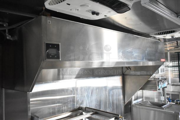 Brand new 2021 Rock Solid Cargo 24' mobile kitchen trailer with CaptiveAire grease hood, sinks, and commercial equipment.