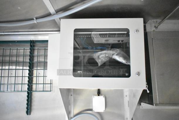 Brand new 2021 Rock Solid Cargo 24' mobile kitchen trailer interior, featuring APC panel and commercial-grade equipment.