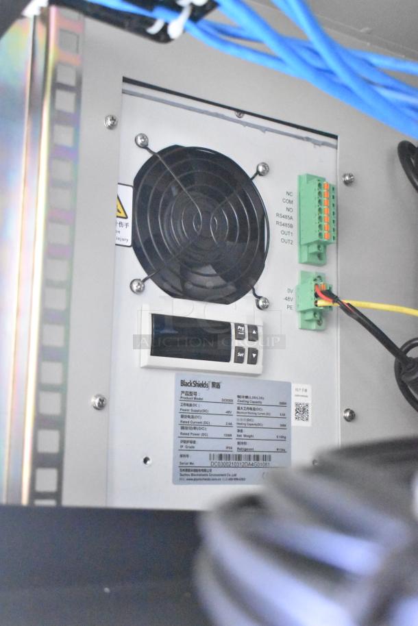 Ventilation and control panel inside 2021 Rock Solid Cargo trailer, featuring BlackShields model details and wiring connections.