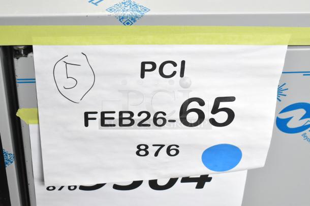 Auction label on a Perlick BBS60-RF-Y-S-X-H1 refrigerator. Marked as PCI FEB26-65, 876, with a hand-drawn number 5.