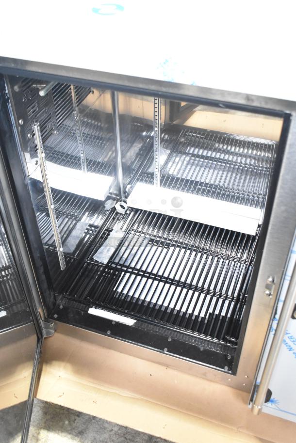 Brand new 2025 Perlick BBS60-RF-Y-S-X-H1 60" commercial black solid door back bar refrigerator. Minor scratches, dented.