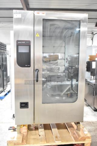 2023 Henny Penny FPGM22172007 Commercial Natural Gas Powered Roll In Rack Combi Convection Oven w/ Pan Transport Rack. 200,000 BTU.