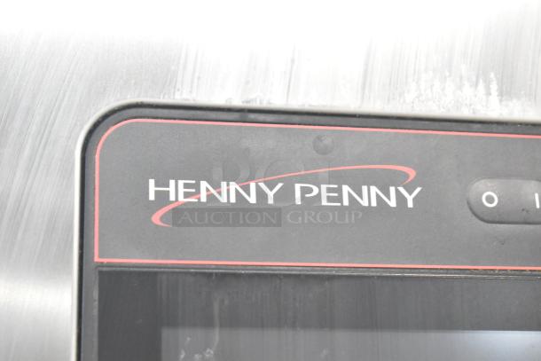 Henny Penny logo on 2023 FPGM22172007 Commercial Gas-Powered Combi Convection Oven. 200,000 BTU, includes pan transport rack.