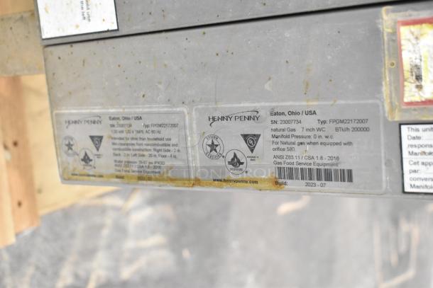 2023 Henny Penny FPGM22172007 commercial natural gas convection oven label with 200,000 BTU details and certifications.