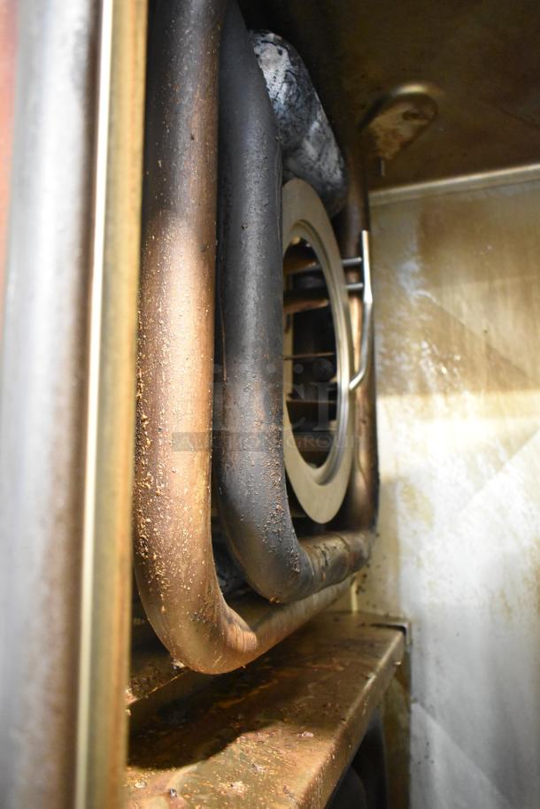 2023 Henny Penny FPGM22172007 Combi Convection Oven interior, showing natural gas heating elements, 200,000 BTU.