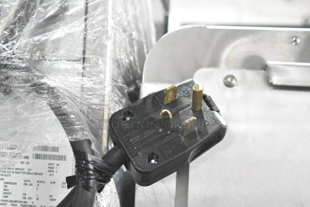 2017 Ice-O-Matic ICE1406HW6 ice head plug with label. 208-230V, 1 phase. Commercial use. Clear plastic wrap visible.